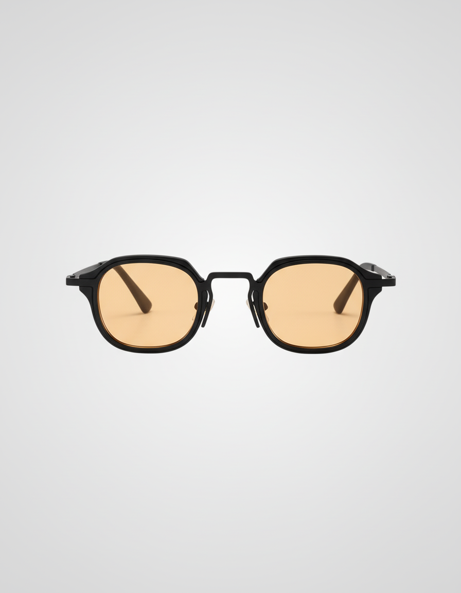 Sunglasses with black frame and yellow-tinted lenses on a light gray background