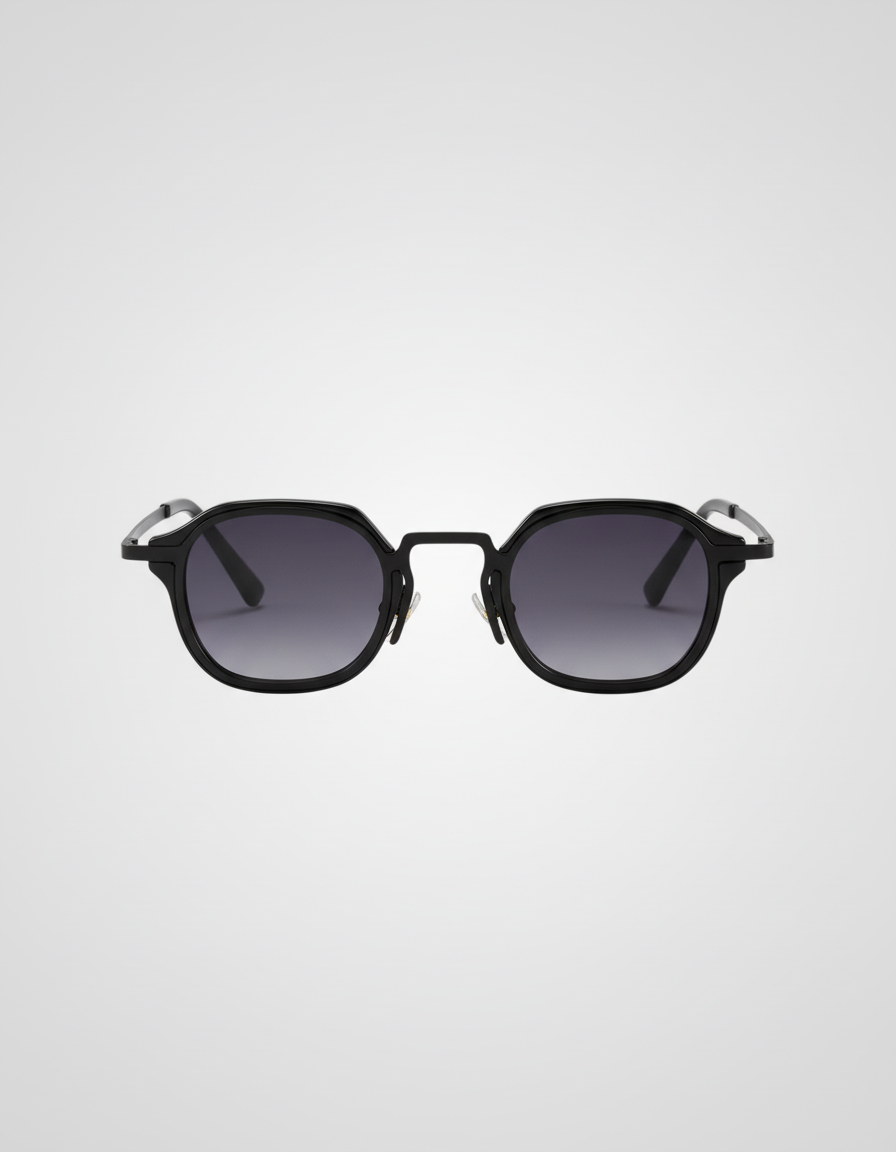 Black sunglasses with gradient lenses on a light gray background