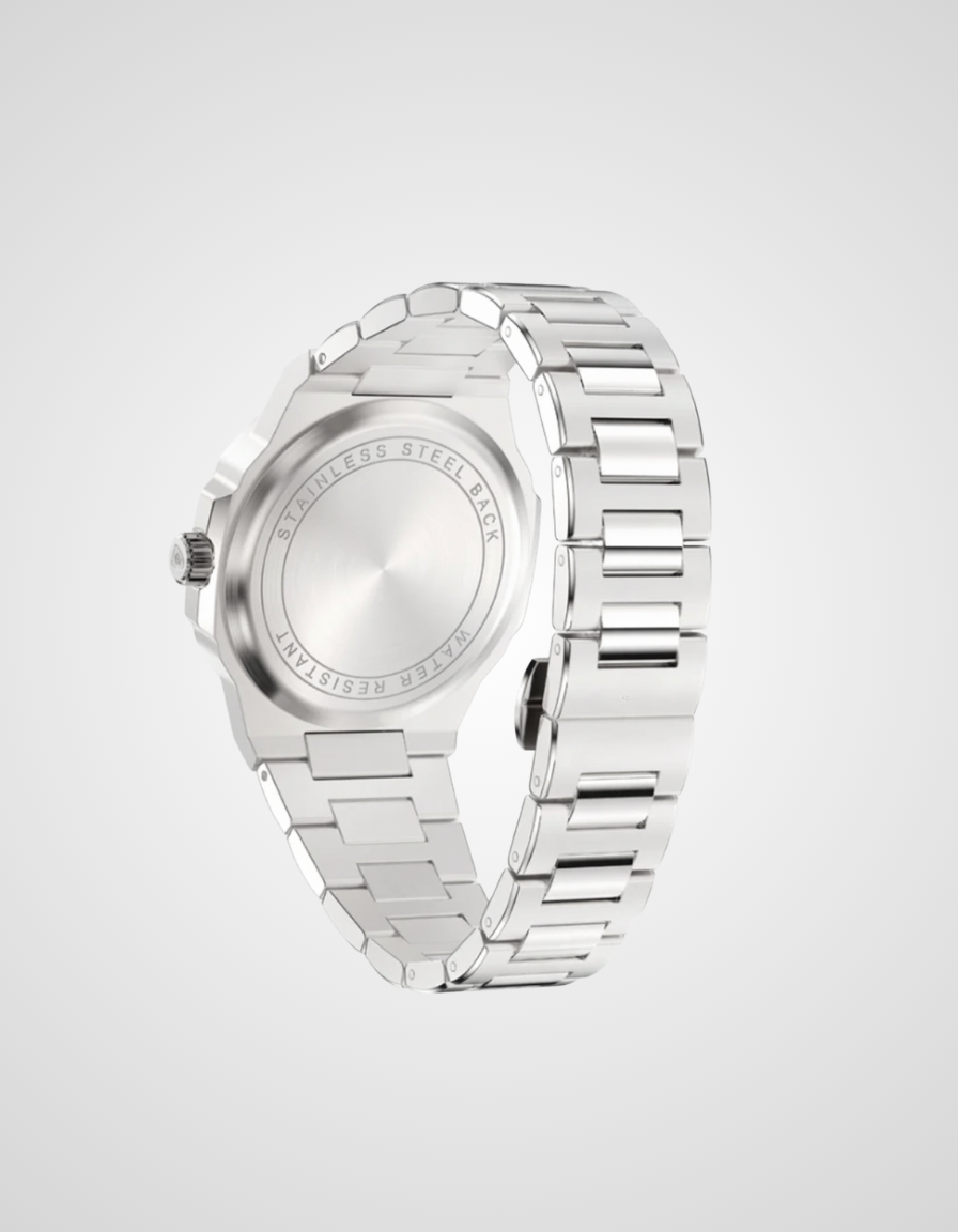 Silver watch with a reflective face on a light gray background