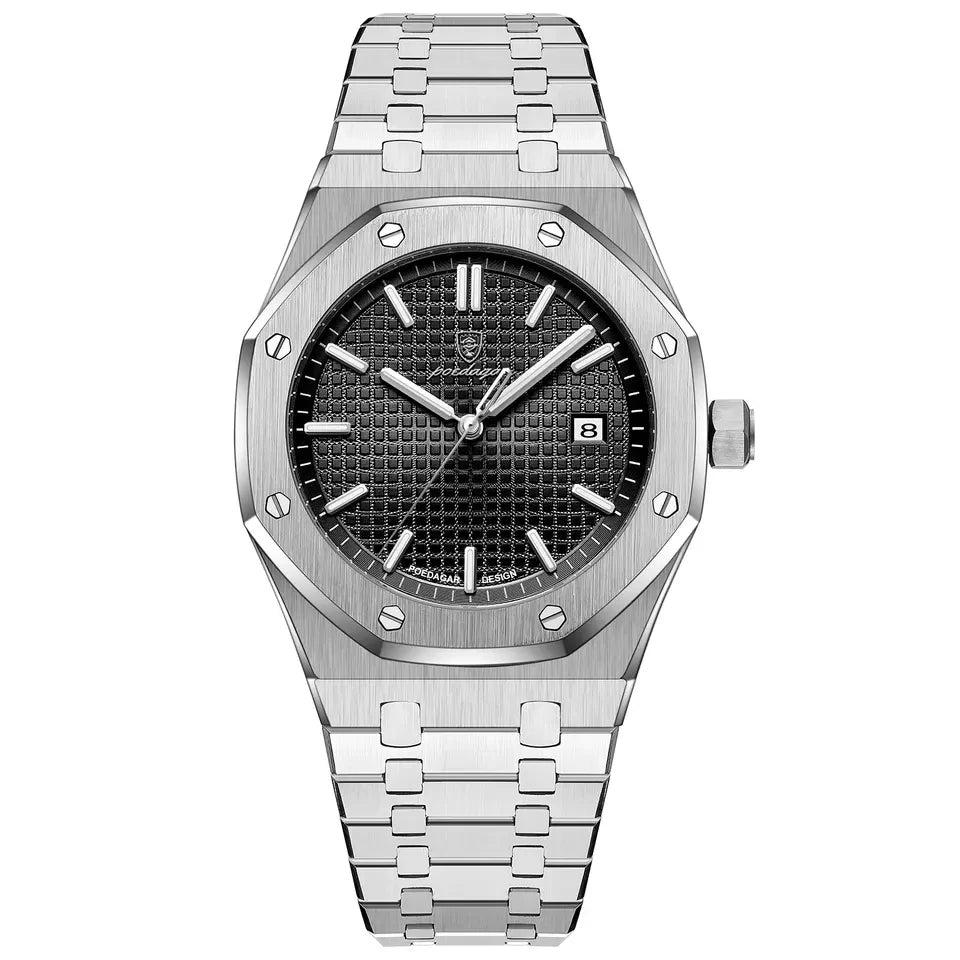 A silver ESTAMO Héritage watch with a black dial and a stainless steel bracelet.
