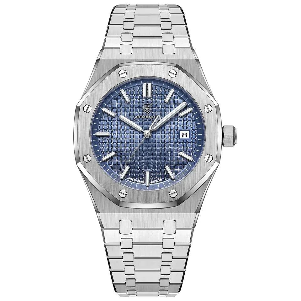 A silver ESTAMO Héritage watch with a blue dial and a stainless steel bracelet.
